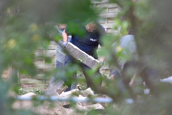 German police search a garden that belo<em></em>nged to Christian Brueckner in July 2020. 