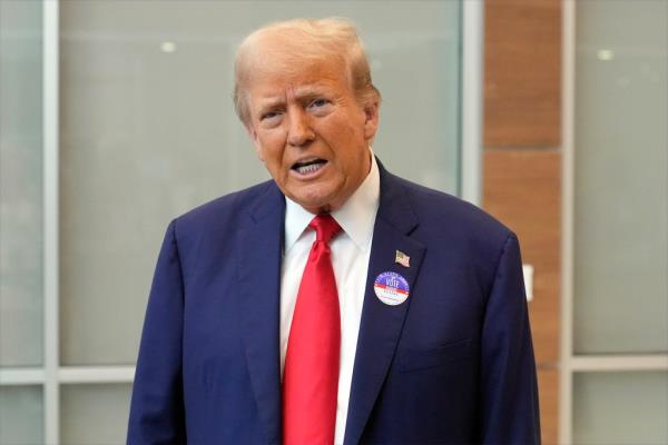 Former President Do<em></em>nald Trump speaking at the Palm Beach County Supervisor of Elections in West Palm Beach, Florida, voting early in the 2024 Florida primary.