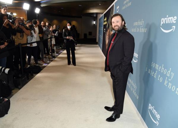 Haley Joel Osment in 2024 smiling. 