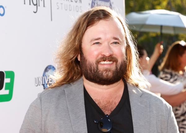 Haley Joel Osment smiling. 