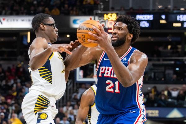 Philadelphia 76ers center Joel Embiid (21) shoots the ball while Indiana Pacers forward Jalen Smith (25) defends in the second half.