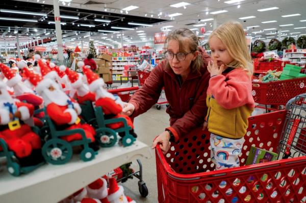 Margaret Sietsema and daughter Azalea shop at a Target store on Nov. 21, 2023.