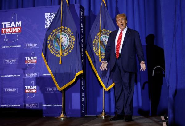 CONCORD, NEW HAMPSHIRE - JANUARY 19: Republican presidential candidate and former President Do<em></em>nald Trump greets the crowd during a campaign rally at the Grappone Co<em></em>nvention Center on January 19, 2024 in Concord, New Hampshire. New Hampshire voters will weigh in next week on the Republican nominating race with their first-in-the-nation primary, a<em></em>bout one week after Trump's record-setting win in the Iowa caucuses. Former UN Ambassador and former South Carolina Gov. Nikki Haley is hoping for a strong second-place showing so to co<em></em>ntinue her campaign into Nevada and South Carolina. (Photo by Chip Somodevilla/Getty Images) *** BESTPIX ***