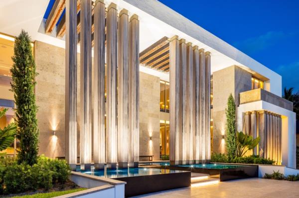 The 1.5-acre estate, boasting both Atlantic Ocean and Intracoastal Waterway views, features a 20,000-square-foot co<em></em>ntemporary home with six bedrooms, indoor and outdoor pools, and a boat dock. 