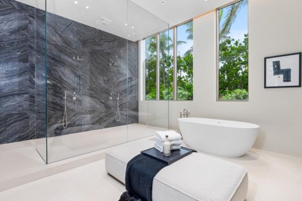 Another bathroom with a rain shower. 