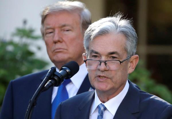 Fed Chair Jerome Powell in 2017 as Trump looks on.