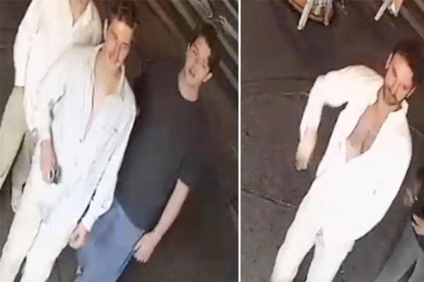 A surveillance image of the three suspects in the Pride flag vandalism.