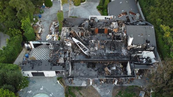 Burned down remains of Cara Delevingne's $7million Los Angeles home with a lot of debris