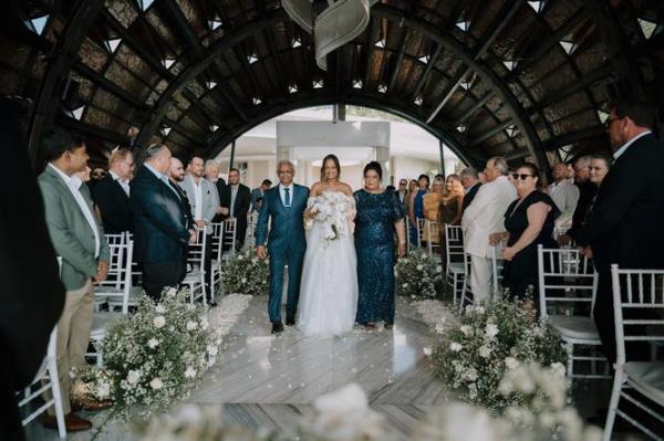 Beautiful bride Tina walkinf down the aisle with her nearest and dearest