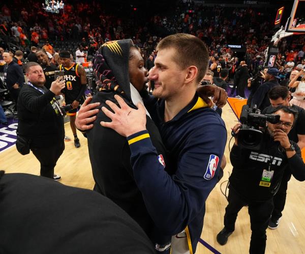 Kevin Durant #35 of the Phoenix Suns and Nikola Jokic #15 of the Denver Nuggets after Game Six of the Western Co<em></em>nference Semi-Finals of the 2023 NBA Playoffs on May 11, 2023 at Footprint Center in Phoenix, Arizona.  