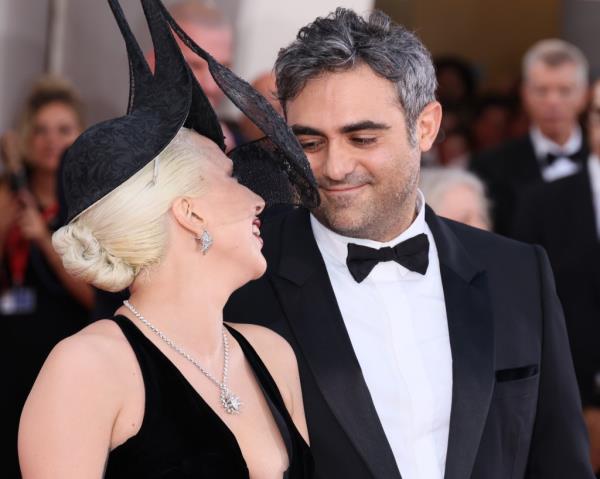 Fans loved the way Gaga supported Polansky as the pair were swarmed by photographers and fans.