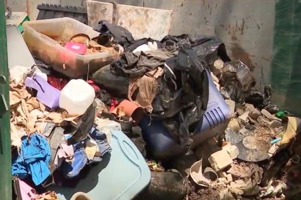 Garbage is strewn across the property.