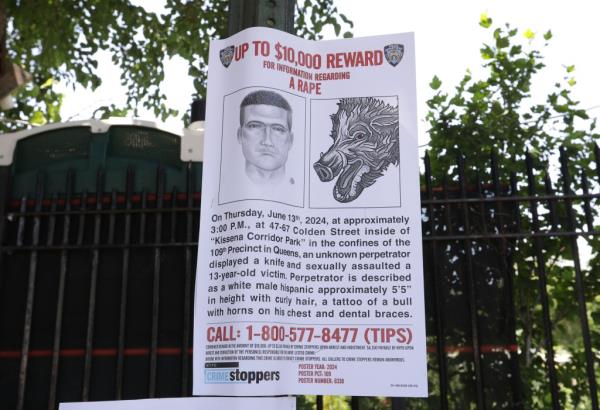 A wanted poster offering a $10,000 reward.