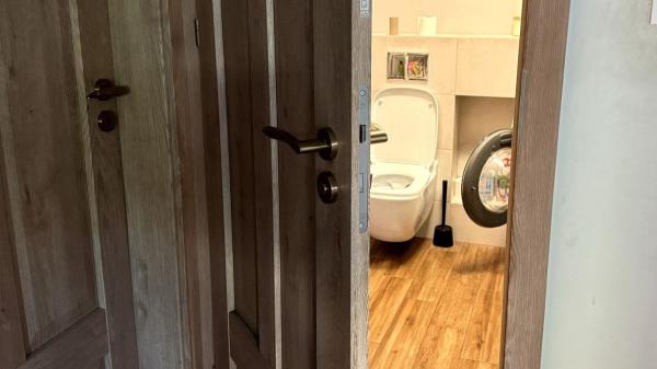This door should always open outwards. If it does not, it will not be safe