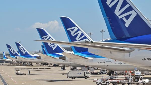 Japan plane turns back after man bites cabin attendant