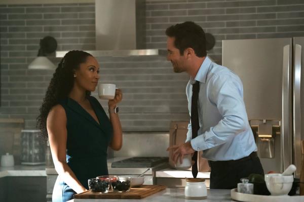 Andrea and Mickey in a kitchen scene from Lincoln Lawyer season 3